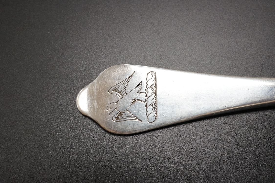 A Queen Anne Britannia standard silver dog nose spoon, indistinct maker's mark, London, 1704, with rat-tail bowl and later? engraved crest, 19.8cm, 63 grams.